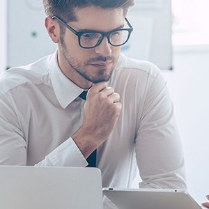 Man looking at a computer