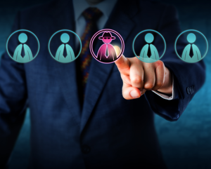 Business man in suit clicking on hacker button with hat and sunglasses